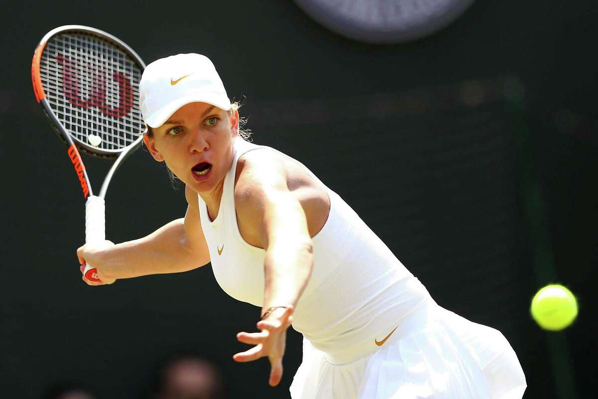 World No. 1 Simona Halep, returning a shot against Su-Wei Hsieh July 7 at Wimbledon, has committed to play at the Connecticut Open next month in New Haven. (Photo by Michael Steele/Getty Images)