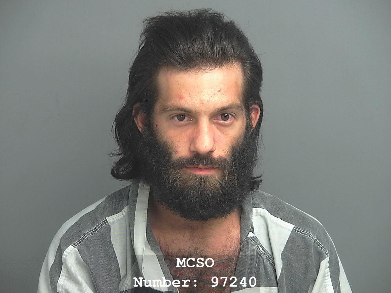 New Caney man charged with setting elderly woman's home on fire