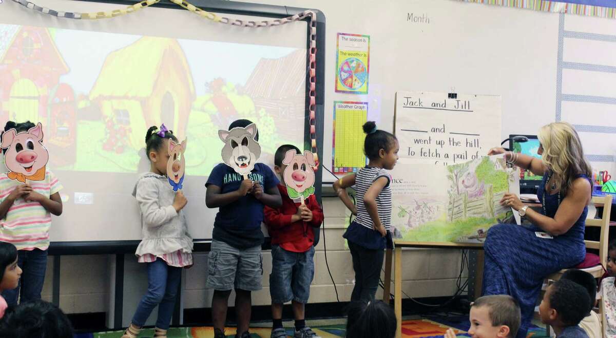 Students at the Summer Start program at Stillmeadow Elementary School in Stamford, Conn. act out a reading of "The Three Little Pigs." Summer Start offers 76 incoming kindergartners in Stamford a chance at a preschool experience before starting school in the fall.