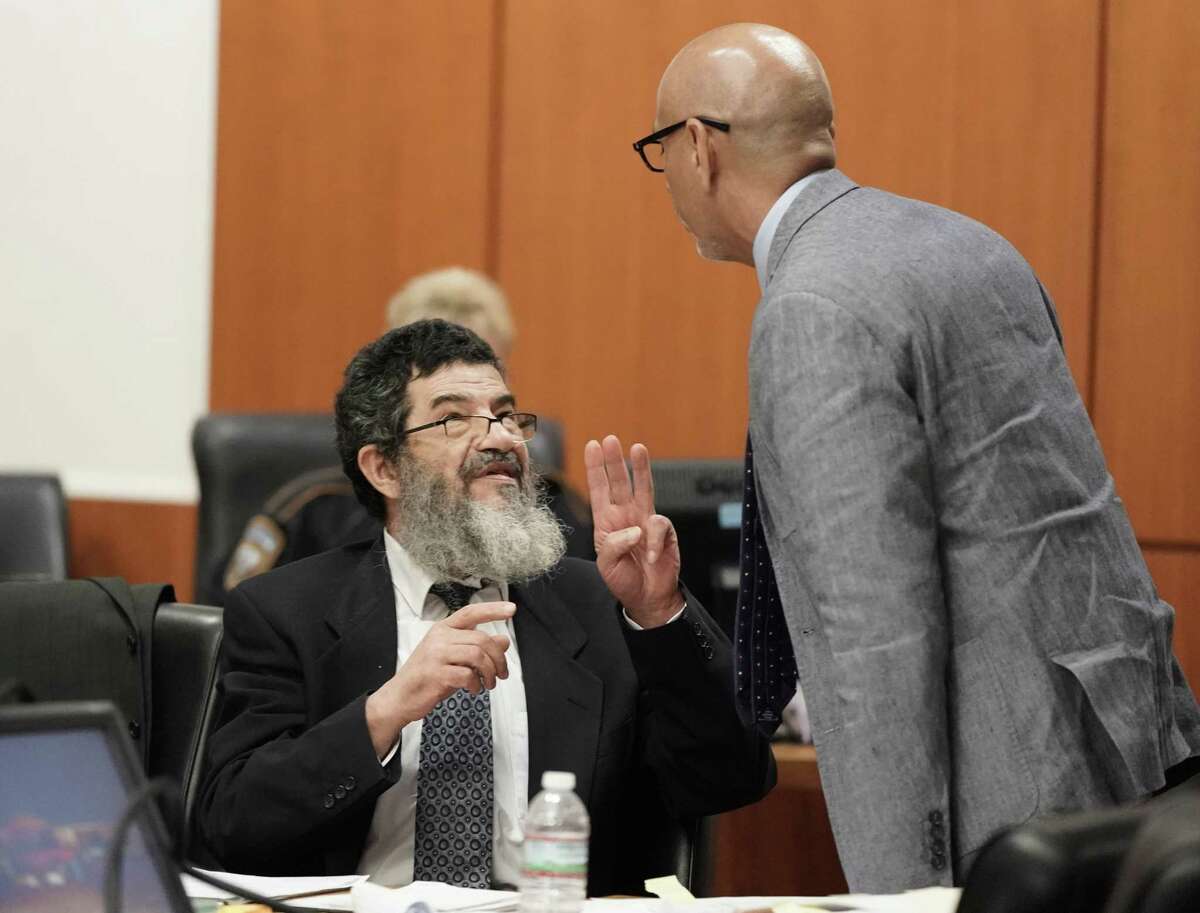 Ali Mahwood-Awad Irsan, left, is shown in court with his defense attorney Rudy Duarte, right, Monday, June 25, 2018. Irsan was charged with capital murder because his alleged crime involved multiple victims  his daughters best friend, Gelareh Bagherzadeh, an Iranian medical student and activist, and his daughters husband, Coty Beavers, 28. Both slayings, authorities said, were driven by the anger of Irsan, a conservative Muslim, over his daughter Nesreens decision to marry Beavers, a Christian from Houston. ( Melissa Phillip / Houston Chronicle )