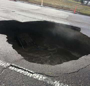 Sinkhole Swallows Suv Driver Narrowly Escapes Sfchronicle Com