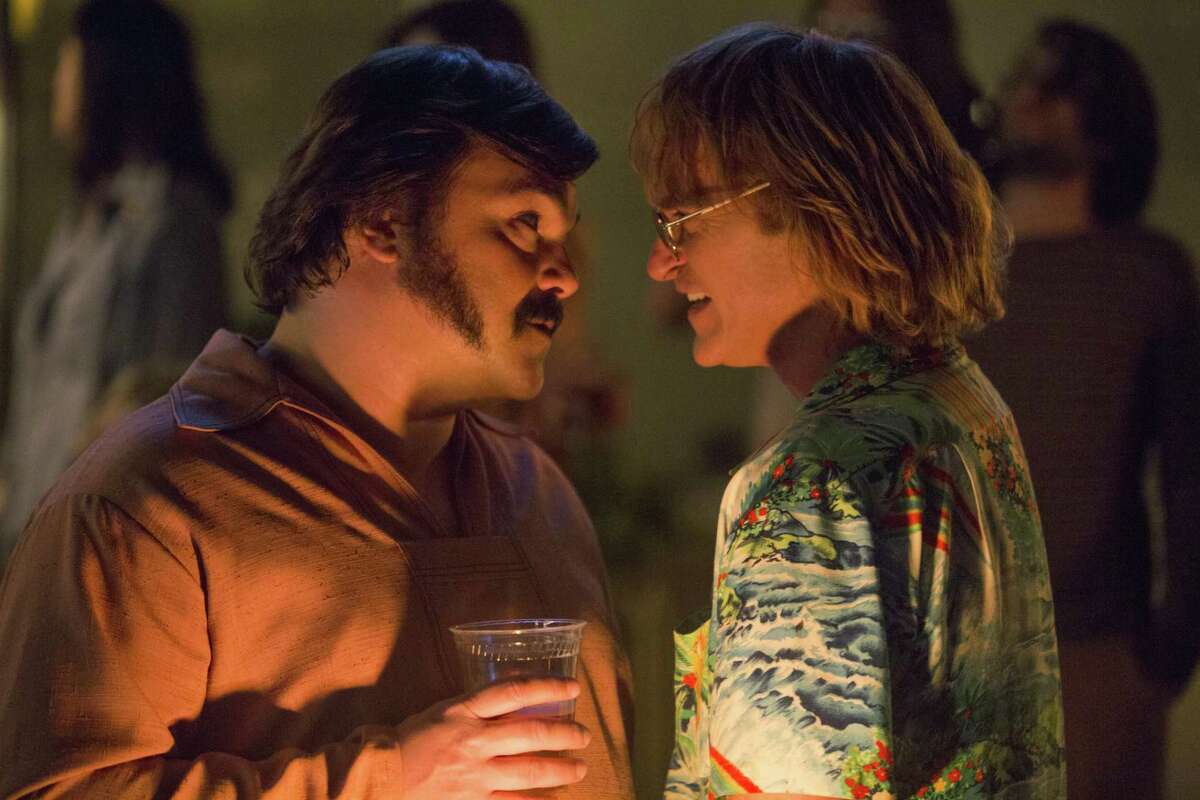 Jack Black, left, and Joaquin Phoenix in a scene from “Don’t Worry, He Won’t Get Far On Foot.”