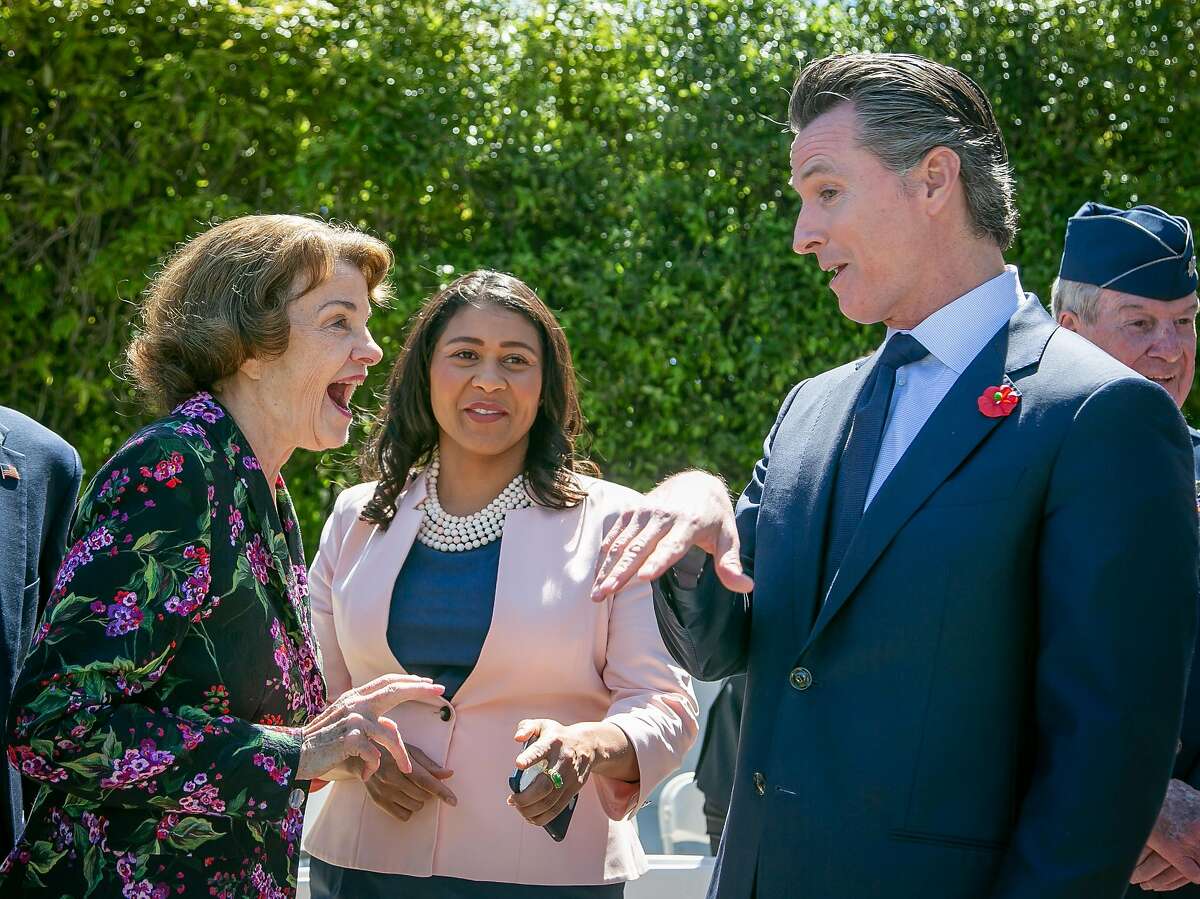 Senator Feinstein with Supervisor London Breed, (middle), and Lt. Governor Gavin Newsom before the Memorial Day Ceremony at the Presidio National Cemetery in San Francisco, Calif., on May 28th, 2018.