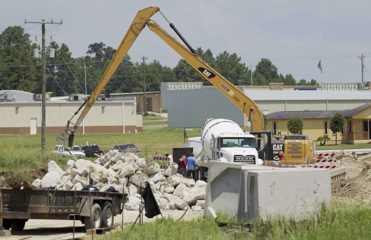 Construction on the Buffalo Springs Bridge continues on Wednesday, July 25, 2018, in Montgomery. Contractors estimate the bridge repair work will be completed in August. The bridge was damaged and closed in May 2016 following the Tax Day flood. The repair project totals $1.86 million with FEMA funding expected to cover 75 percent of the project. The rest of the cost will be paid by the city of Montgomery though a $350,000 Community Development Block Grant for disaster relief.