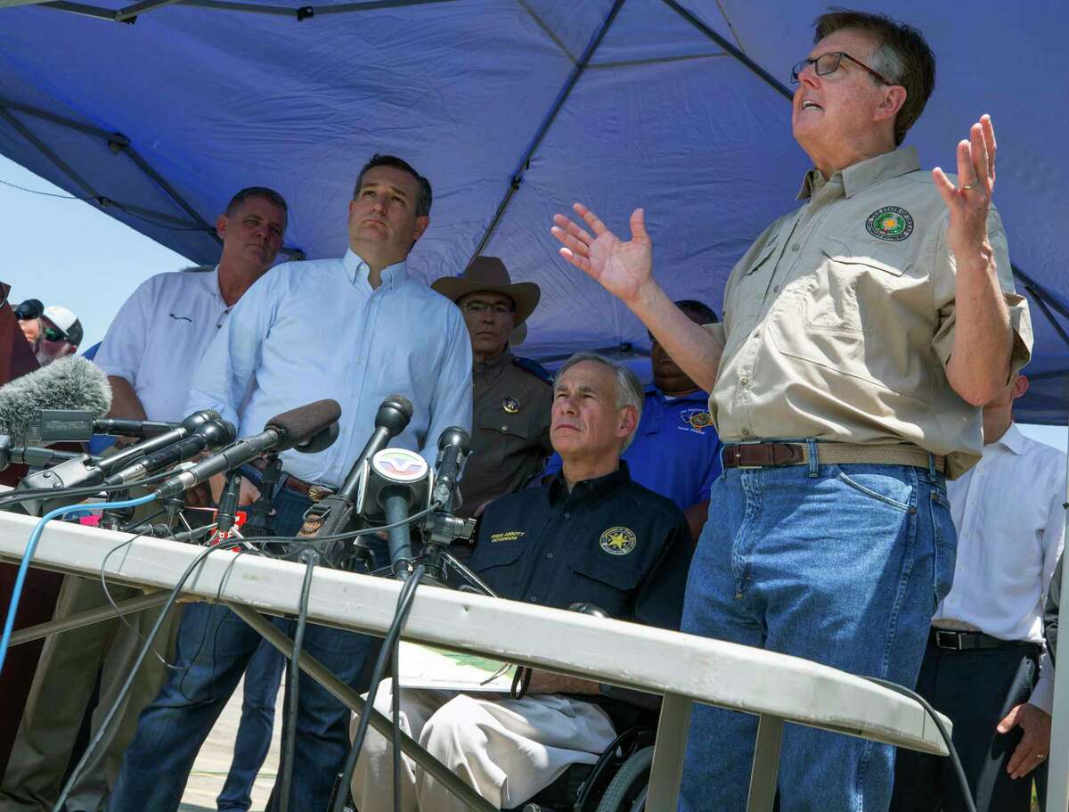 Lt. Governor Dan Patrick, at right, speaks at a press conference in the wake the mass shooting at Santa Fe High School on Friday, May 18, 2018. At left are Texas Gov. Greg Abbott and Sen. Ted Cruz. (Stuart Villanueva/The Galveston County Daily News via AP)