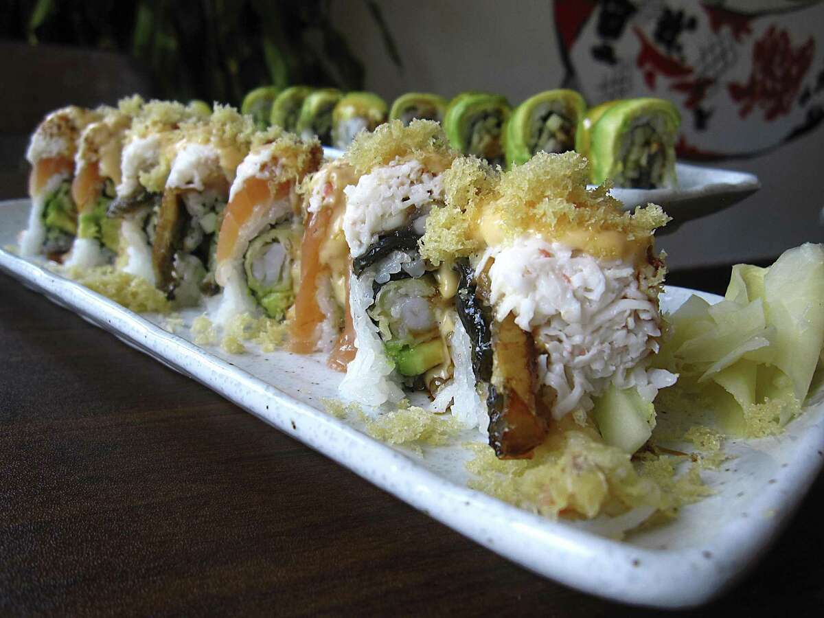 Tomodachi Roll (shrimp tempura, cucumber, avocado, salmon, eel, crab, eel sauce and spicy mayo), foreground, and a Caterpillar Roll with eel, cucumber, avocado and eel sauce from Koi Kawa.