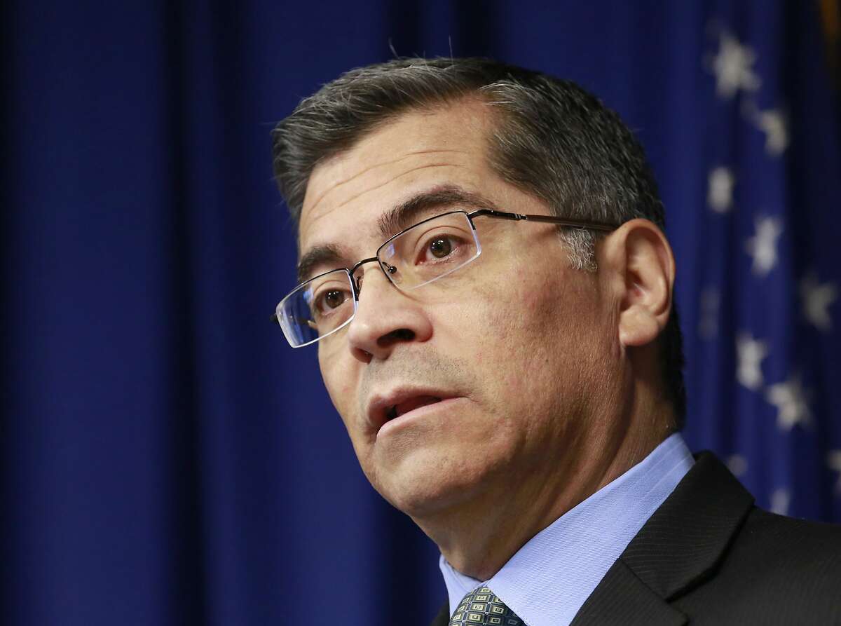 FILE - In this Feb. 20, 2018, file photo, California Attorney General Xavier Becerra speaks at a news conference in Sacramento, Calif. Gun owners' rights organizations filed a lawsuit, Wednesday, July 11, 2018, against Becerra and his Department of Justice alleging that the system for registering so-called bullet-button assault weapons was unavailable for most of the week before the July 1, 2018 deadline. The suit says owners who were unable to register by the deadline now potentially face prosecution through no fault of their own. (AP Photo/Rich Pedroncelli, File)