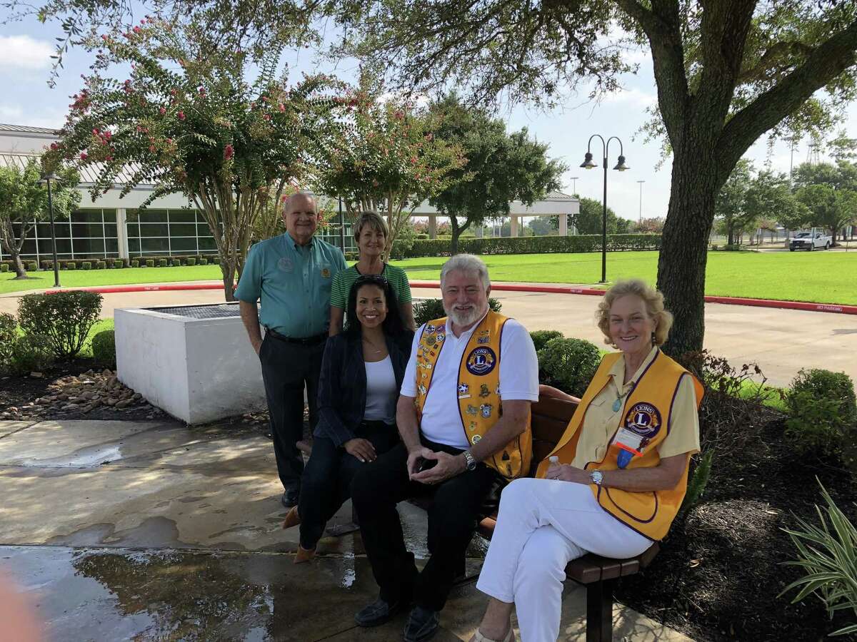 The Humble Noon Lions Club, and representatives from the Humble Civic Center and city of Humble celebrate a bench dedication at the Humble Civic Center on Friday, July 20. Left to right: Humble Mayor Merle Aaron, Cindy Folsum with Humble Civic Center, Humble Civic Center director Jennifer Wooden, Lion Neil Lander and Lion Karen Edwards.