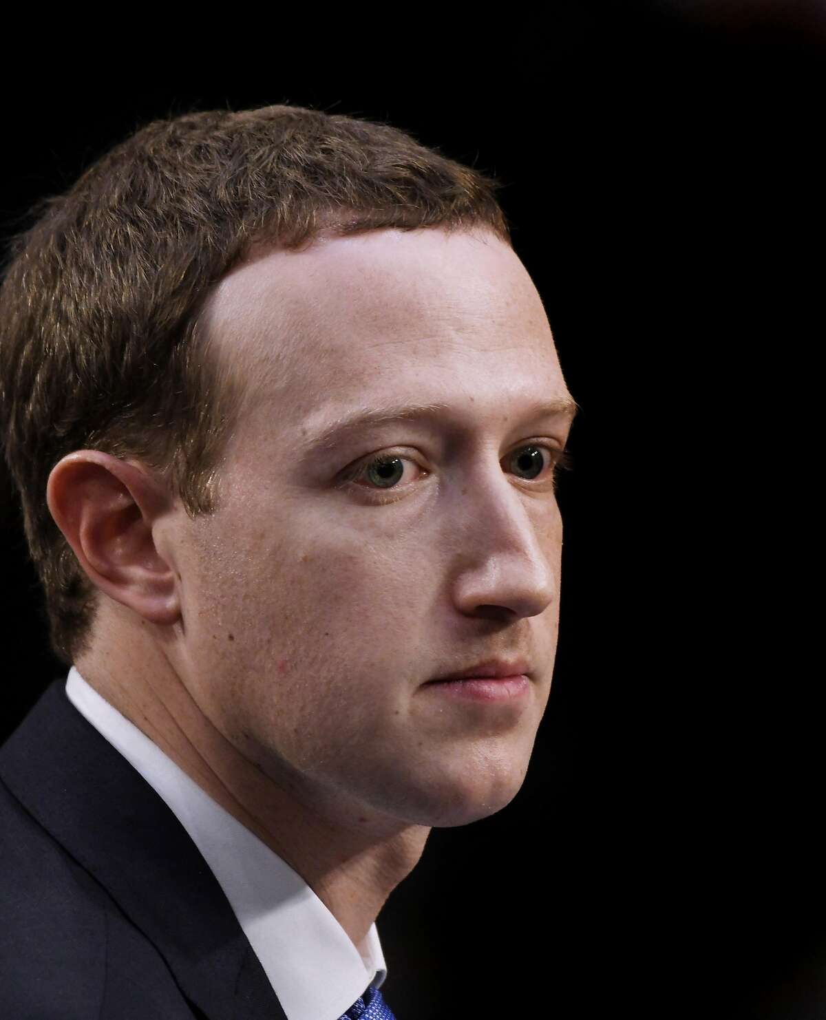 Facebook CEO Mark Zuckerberg testifies before the Senate judiciary and commerce committees on Capitol Hill over social media data breach, on April 10, 2018 in Washington, D.C. The company's stock plummeted Thursday after the company warned growth is slowing. (Olivier Douliery/Abaca Press/TNS)