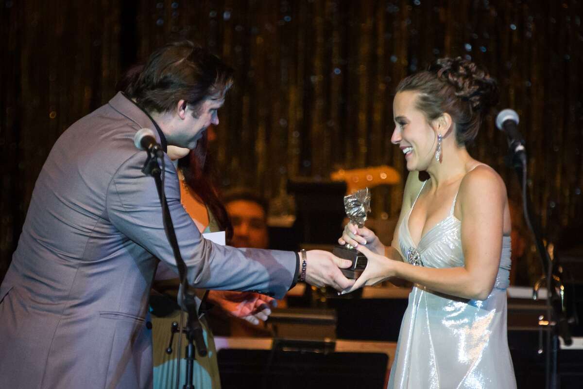 Cara Woodard accepts the Montie for Best Lead Actress in a Musical in "West Side Story" during The Montie Awards on Saturday, Aug. 12, 2017, at the Crighton Theatre.