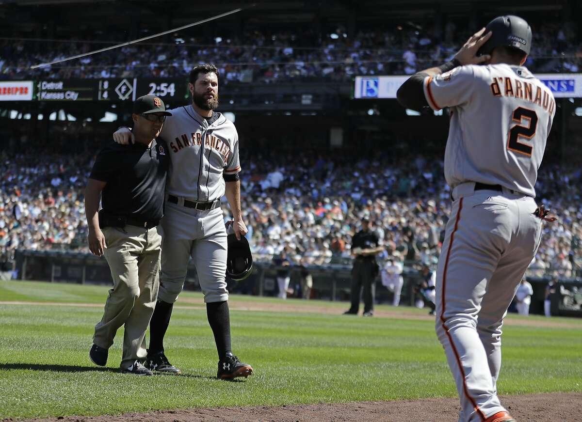 SF Giants' Brandon Belt exits game after hit by pitch