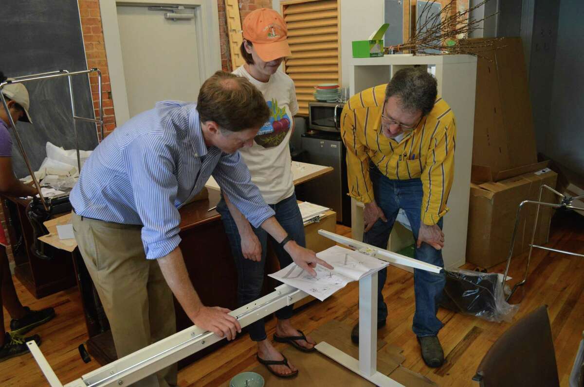 Ikea New Haven donated $3,000 worth of furnishings to the New Haven Land Trust’s new office space Thursday, helping Land Trust employees and volunteers assemble the furniture and storage units.