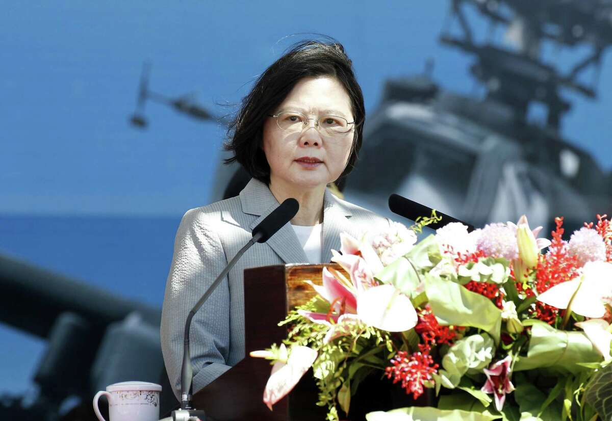 Taiwan President Tsai Ing-wen delivers a speech during a commissioning ceremony of the countrys first AH-64E Apache attack helicopter squadron in Taoyuan city, northern Taiwan, Tuesday, July 17, 2018.