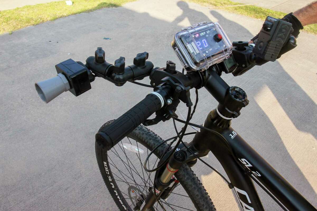 The C3FT unit, mounted on the bicycle's handlebars, records distance of passing motorists from the bicycle. The sensor on the left, reads the distance and the unit on the right shows the distance of the passing vehicle from the bike's handlebars. The system also has a camera that records a photo of the passing vehicle. HPD demonstrated the unit which will be used to help enforce the Safe Passing ordinance.