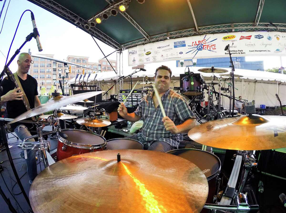 Jared Vergilis, drummer for the Sean Austin Band who is from Ridgefield plays during the opening of the Alive@ Five concert series for headliner Lifehouse at Columbus Park on July 26, 2018 in Stamford, Connecticut.