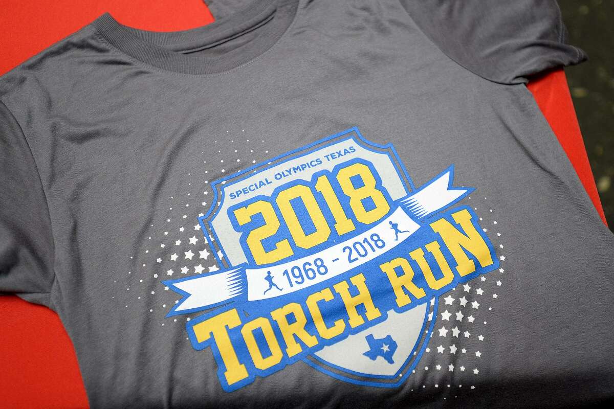 A t-shirt for the Special Olympics Torch Run during the "Tip A Cop" fundraiser for Special Olympics Texas at Texas Roadhouse. Money raised at the event stays in the local area to help by equipment and pay for competitions for athletes. Photo taken Thursday 7/26/18 Ryan Pelham/The Enterprise