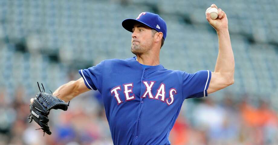 Cubs Acquire Cole Hamels From Rangers Houston Chronicle - baltimore md july 13 cole hamels 35 of the texas rangers pitches