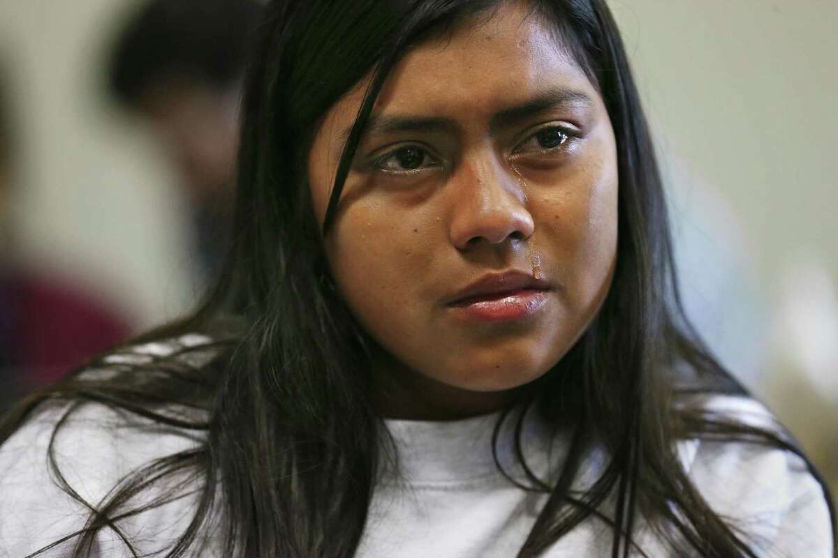Cristhel Nohelia Barahona Sanchez, 15, tears up while talking with media at the Archdiocese of San Antonio Catholic Charities offices, Thursday, July 26, 2019. Sanchez and her mother Sandra Elizabeth Sanchez, 44, were separated after being caught by U.S. Border Patrol in Eagle Pass on June 18th. Sanchez reunited with her daughter Wednesday night after they were released and are headed to Washington State where her older daughter and three grandchildren live. Three days before they were caught, Cristhel celebrated her 15th birthday along the route in Mexico. People around them pitched in and bought her a ìpastelito.î