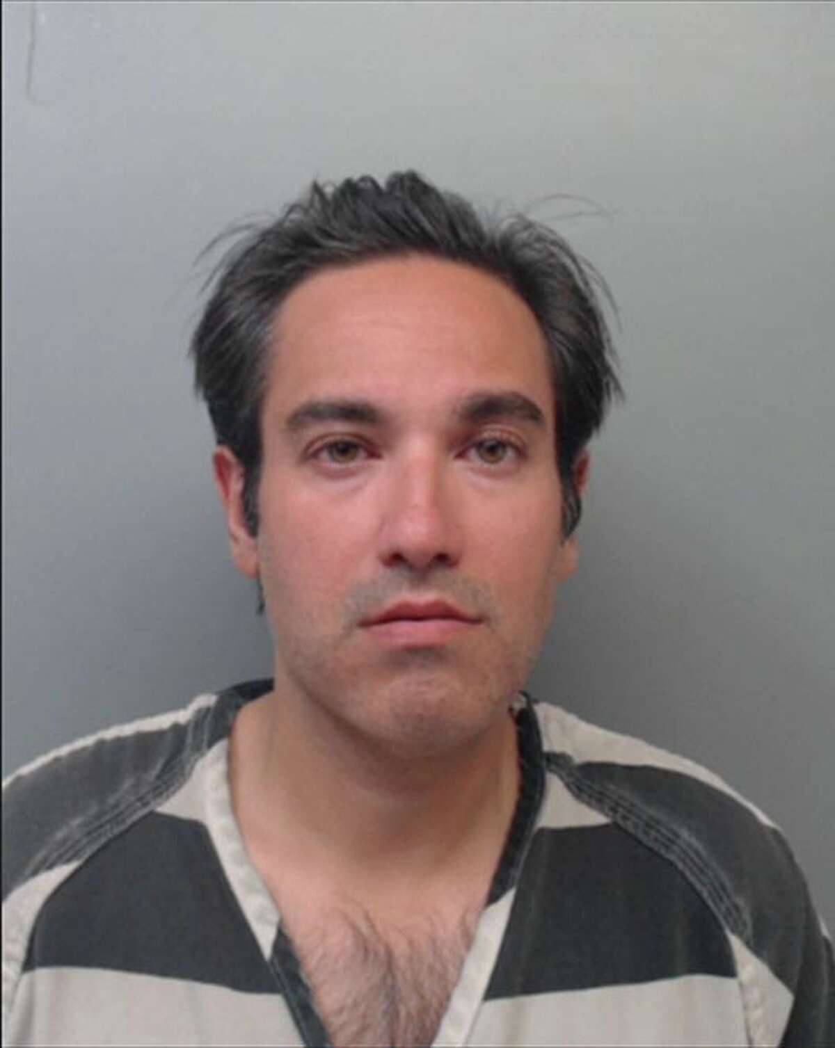 Oscar Ignacio Flores, 39, was charged with stalking and criminal trespass.