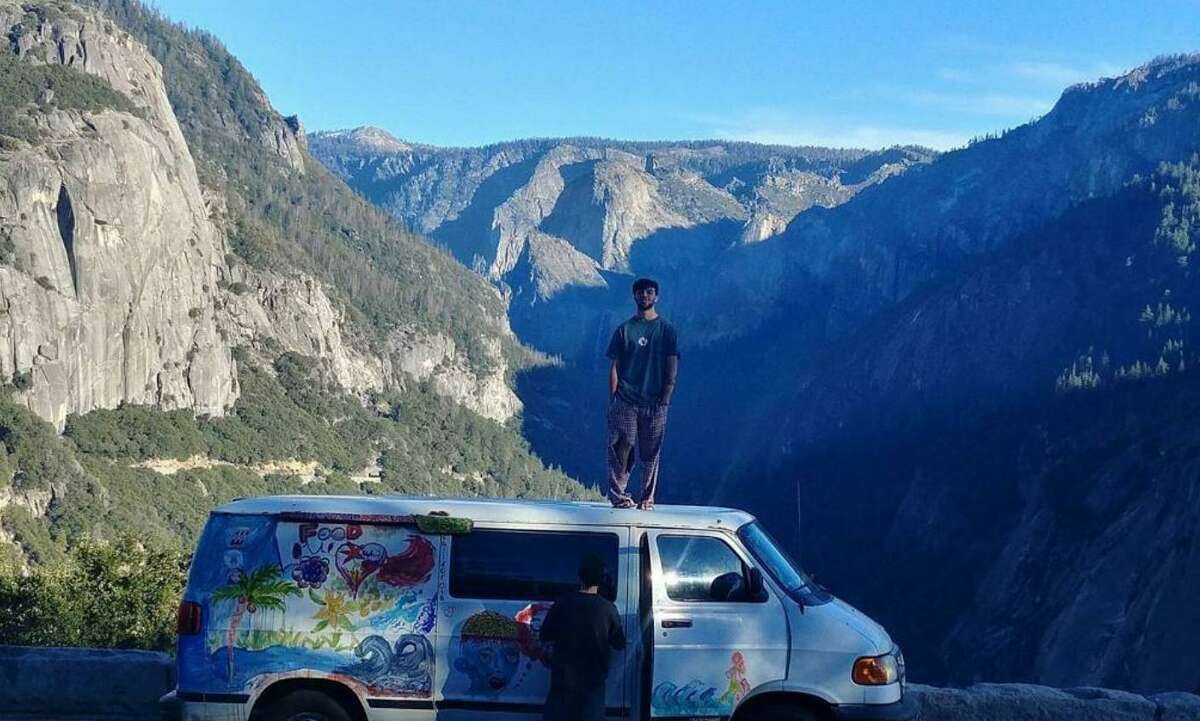 Bodhi Goncharoff on top of his van.