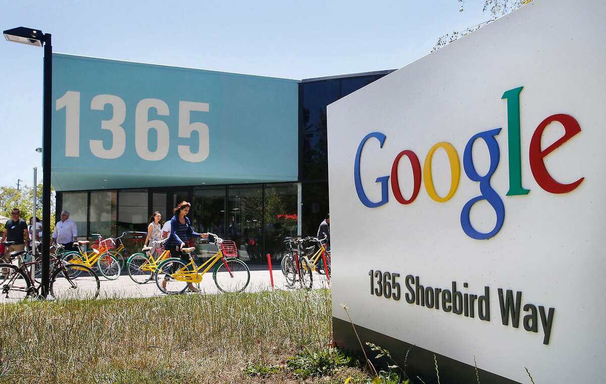 Google employees ride their Google multi-colored bicycles to and from the GooglePlex along Shorebird Way June 24, 2014 in Mountain View, Calif. Google's latest diversity report shows continued struggles in making its workplace more diverse. (Patrick Tehan/Bay Area News Group/TNS)