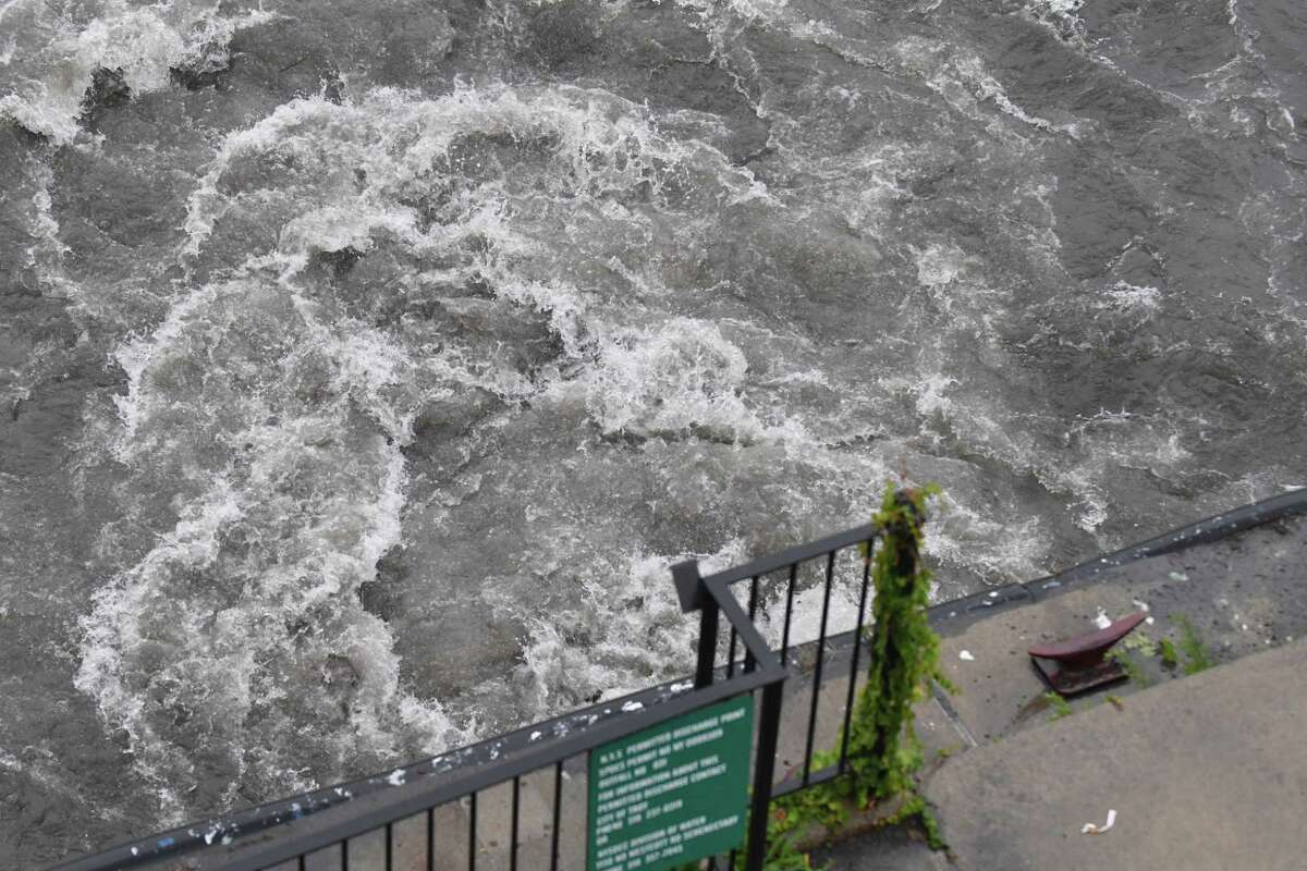 Storm runoff flows into the Hudson River at State Str. on Friday, July 26, 2018, in Troy, N.Y. (Will Waldron/Times Union)