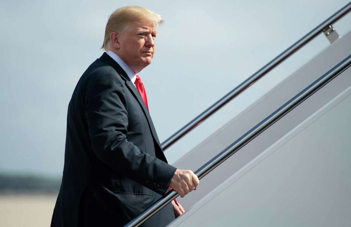 US President Donald Trump boards Air Force One prior to departure from Joint Base Andrews in Maryland, July 26, 2018, as he travels to Iowa and Illinois to speak about the economy. / AFP PHOTO / SAUL LOEBSAUL LOEB/AFP/Getty Images