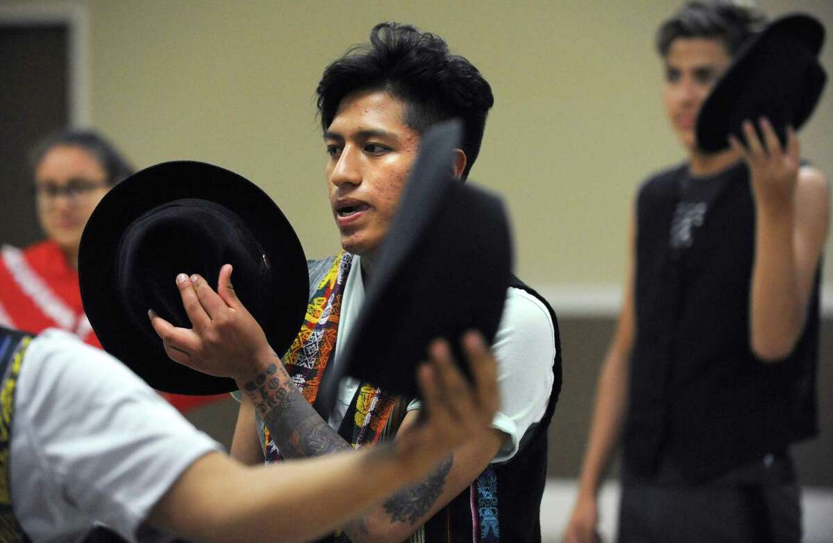 Art students from Norwalk?’s Ecuadorian sister city, Riobamba, including Xavier Cuji, 17, learn traditional dance as part of their visit Thursday, July 26, 2018, at the South Norwalk Community Center in Norwalk, Conn. The students have come to Connecticut to study with people here through the Norwalk Summer Arts Program in painting and dance in studios in Stamford, Norwalk and New Haven. The group is also taking ESL classes with literacy volunteers during their visit.