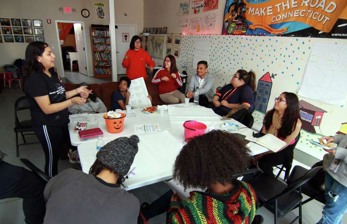 Student Malaska Hernandez, left, gives an update during a weekly Youth Power Committee meeting at Make the Road CT office on State Street in Bridgeport, Conn., on Friday Mar. 16, 2018. The group of mostly immigrant students, have been speaking out for months at city school board meetings about issues that get in the way of their education. The kids will be holding a press conference called "Walking Towards a Brighter Future" on Monday Mar. 26th at City Hall Annex at 999 Broad Street from 4 p.m. to 5 p.m.