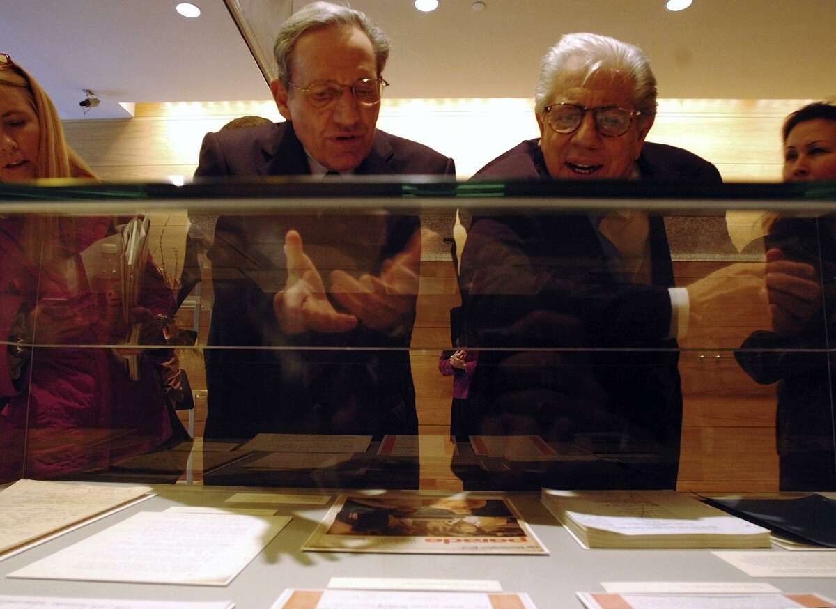 Bob Woodward and Carl Bernstein look over a display of some of their papers related to their coverage of the Watergate Scandal Wednesday, February 3, 2005 at the Ransom Center on the UT Campus. BAHRAM MARK SOBHANI/STAFF