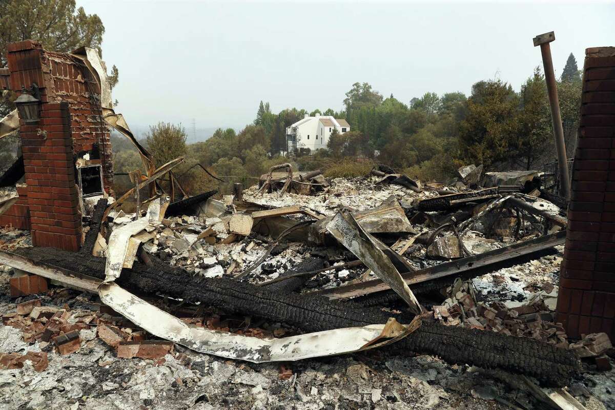 The remains of a destroyed house on Sunkist Court in the aftermath of the Carr Fire in Redding.