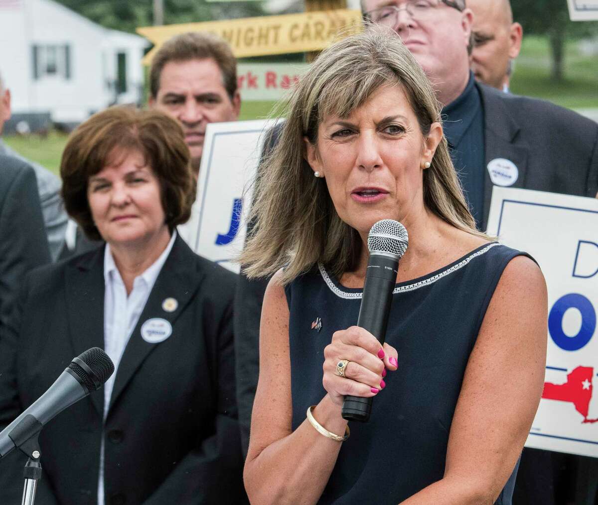 As Senator Kathy Marchione, left watched, Daphne Jordan announced her intention to run for the State Senate Thursday July 26, 2018 at Hayner's Food and Ice-cream shop in Halfmoon, N.Y. (Skip Dickstein/Times Union)