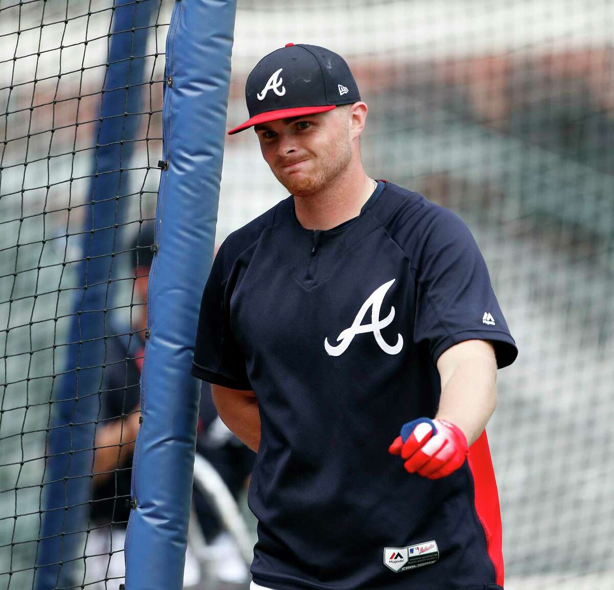 Atlanta Braves starting pitcher Sean Newcomb (15) is shown during batting practice before of a baseball game against the Miami Marlins Monday, July 30, 2018 in Atlanta. Newcomb apologized Sunday for racist, homophobic and sexist tweets he sent as a teenager, calling them "some stupid stuff." "I definitely regret it, for sure," he said. (AP Photo/John Bazemore)