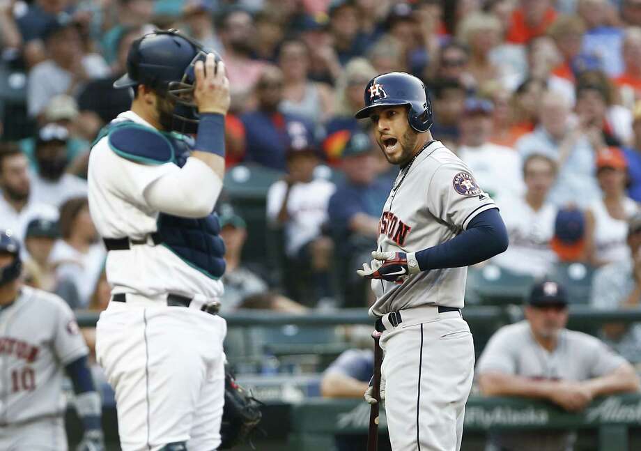   George Springer of the Astros chats with the # 39; home plate referee after being called to watch in the third round against the Seattle Mariners at Safeco Field on July 30, 2018 in Seattle. Photo: Lindsey Wasson, Getty Images / 2018 Getty Images 