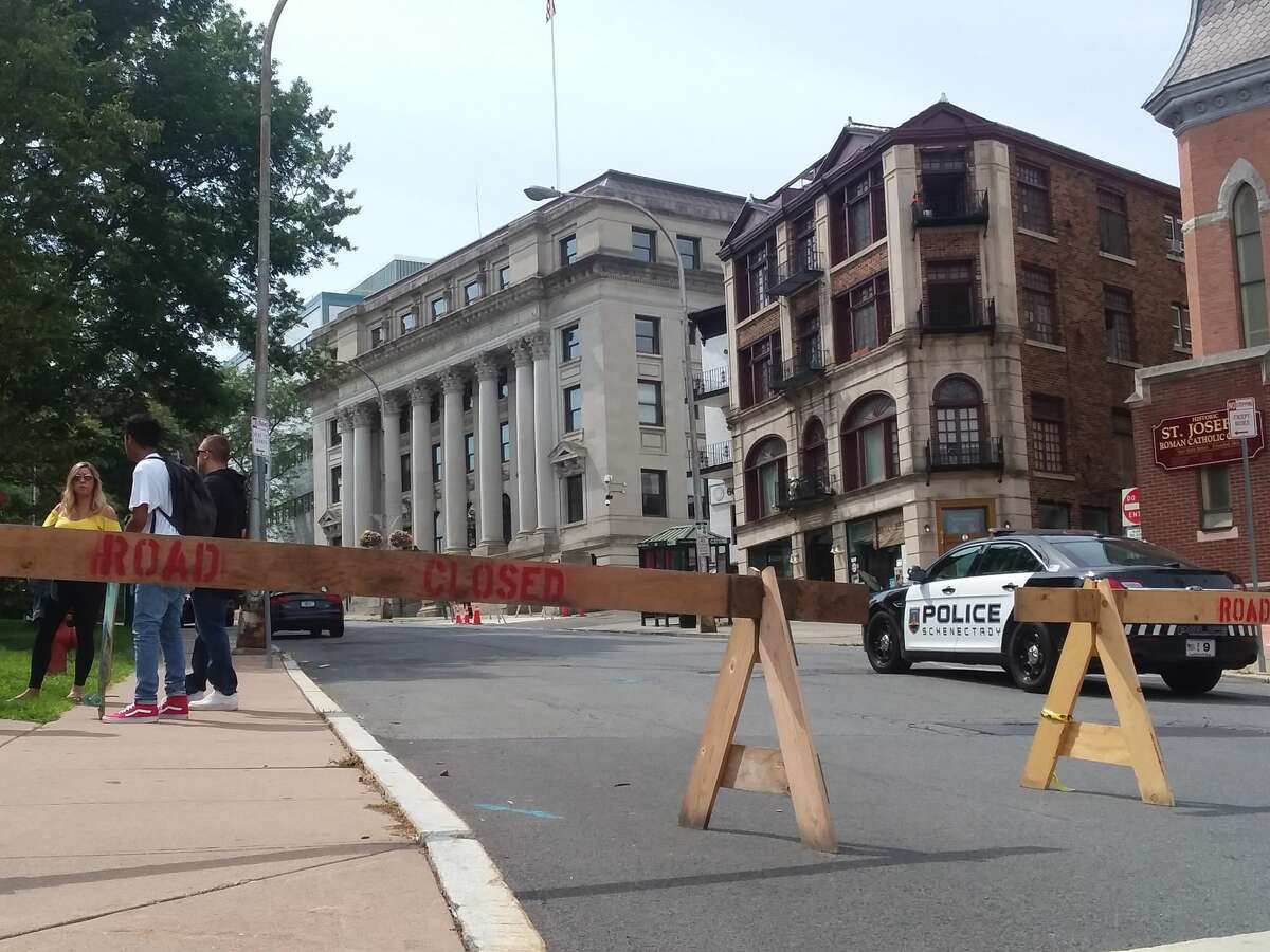 Schenectady police are investigating the discovery of swastikas and other hate symbols that were chalked on buildings around downtown. In this photograph, barriers are set up in downtown Schenectady on Tuesday, July 31, 2018, after city hall, the county courthouse and several other government buildings were evacuated when a threatening note was found. (Kellen Riell/Times Union)