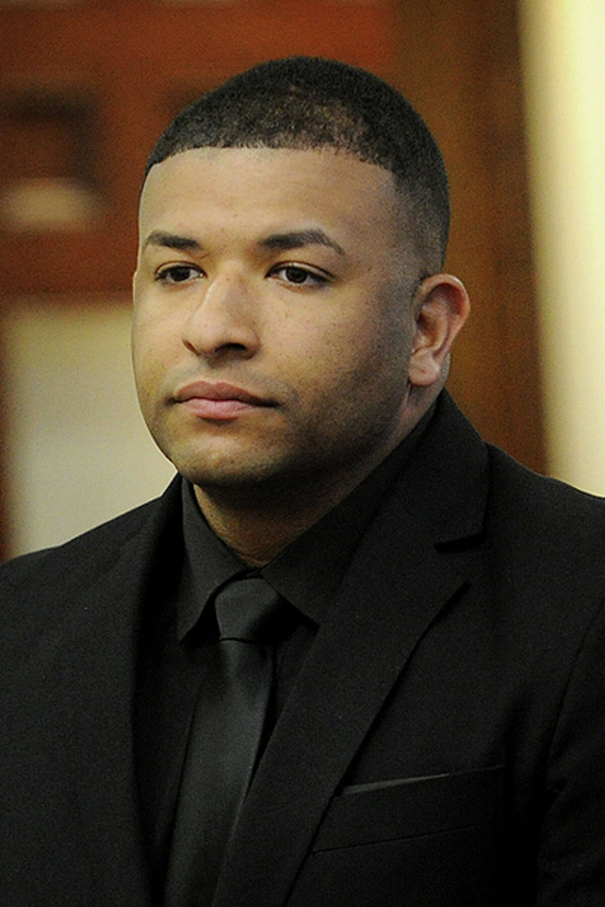 Bridgeport Police Officer Davon Polit, is arraigned on assault charges for the alleged beating of a city resident following a car collision in September, in Superior Court in Bridgeport, Conn. on Wednesday, March 29, 2017.