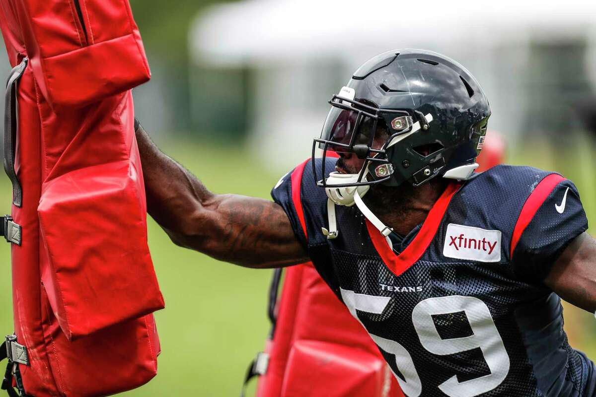 Houston Texans linebacker Whitney Mercilus (59) hits a blocking sled during training camp at the Greenbrier Sports Performance Center on Tuesday, July 31, 2018, in White Sulphur Springs, W.Va.