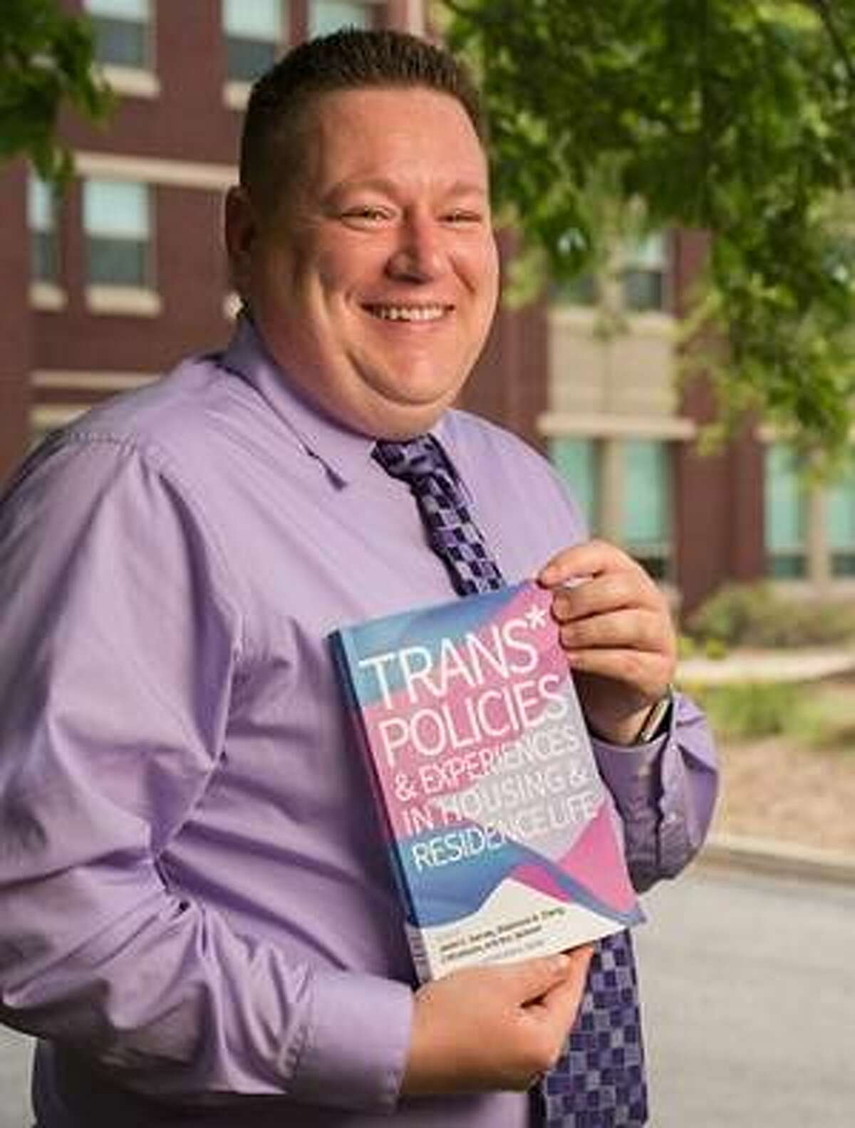 Rex Lee Jackson, SIUE associate director of Residence Life and one of four editors of the book, Trans* Policies & Experiences in Housing & Residence Life.