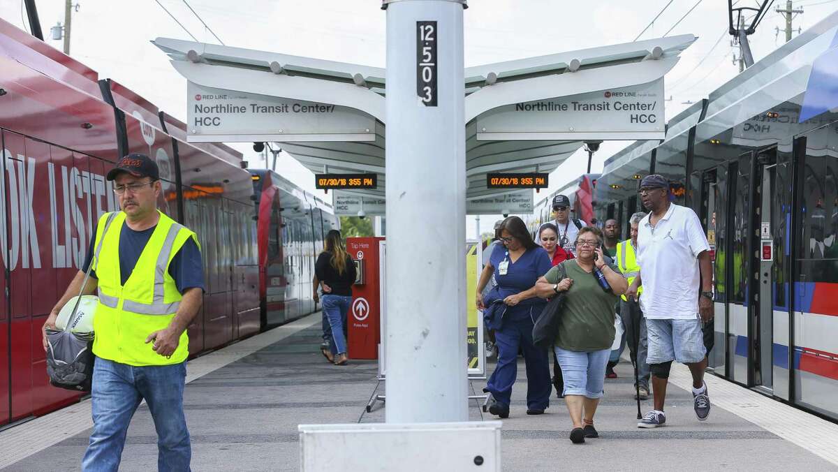Riders disembark a Metropolitan Transit Authority Red Line light rail train at the HCC Northline Commons station on Fulton Street near E. Crosstimbers Street on July 30 in Houston. Metro has discussed extending the Red Line at least to Tidwell Road.