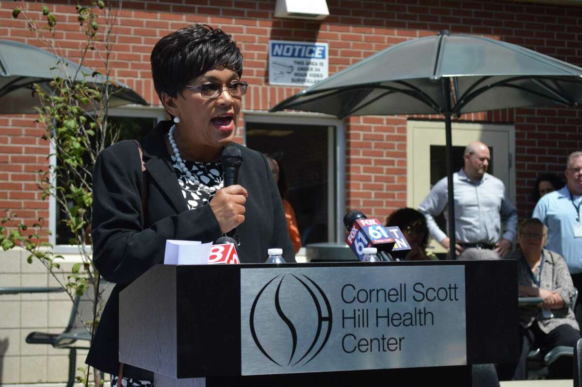 Mayor Toni Harp talks about a $10 million award by the State Bond Commission to the Cornell Scott-Hill Health Center to help build a new recovery and wellness center Tuesday in New Haven.