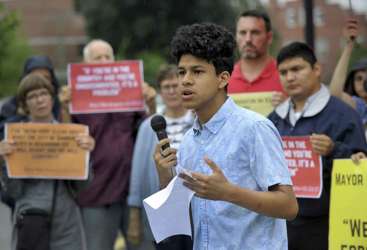 Nelson Neira, 17, of Danbury, with CT Students 4 A Dream, speaks at a 8 a.m. rally at Danbury City Hall Wednesday morning, August 1, 2018. CT Students 4 A Dream and the ACLU will held a rally/press conference outside Danbury City Hall to protest recent ICE arrests in the area and slam Mayor Mark Boughton for cooperating with federal immigration authorities just two weeks out from the hotly contested GOP gubernatorial primary.