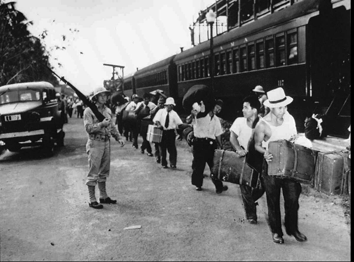 FILE--Japanese Latin Americans are shown in an unknown location en route to internment camps in the United States during World War II in this undated photo from the National Japanese American Historical Society. A class action suit against the United States was filed Wednesday, Aug 28, 1996, on behalf of the Japanese Latin Americans who were abducted and deported to the United States, then held to be exchanged for American prisoners of war. (AP Photo/National Japanese American Historical Society) Ran on: 09-05-2004 Ethnic Japanese are rounded up and interned during World War II; suits were filed on behalf of many of them for restitution.