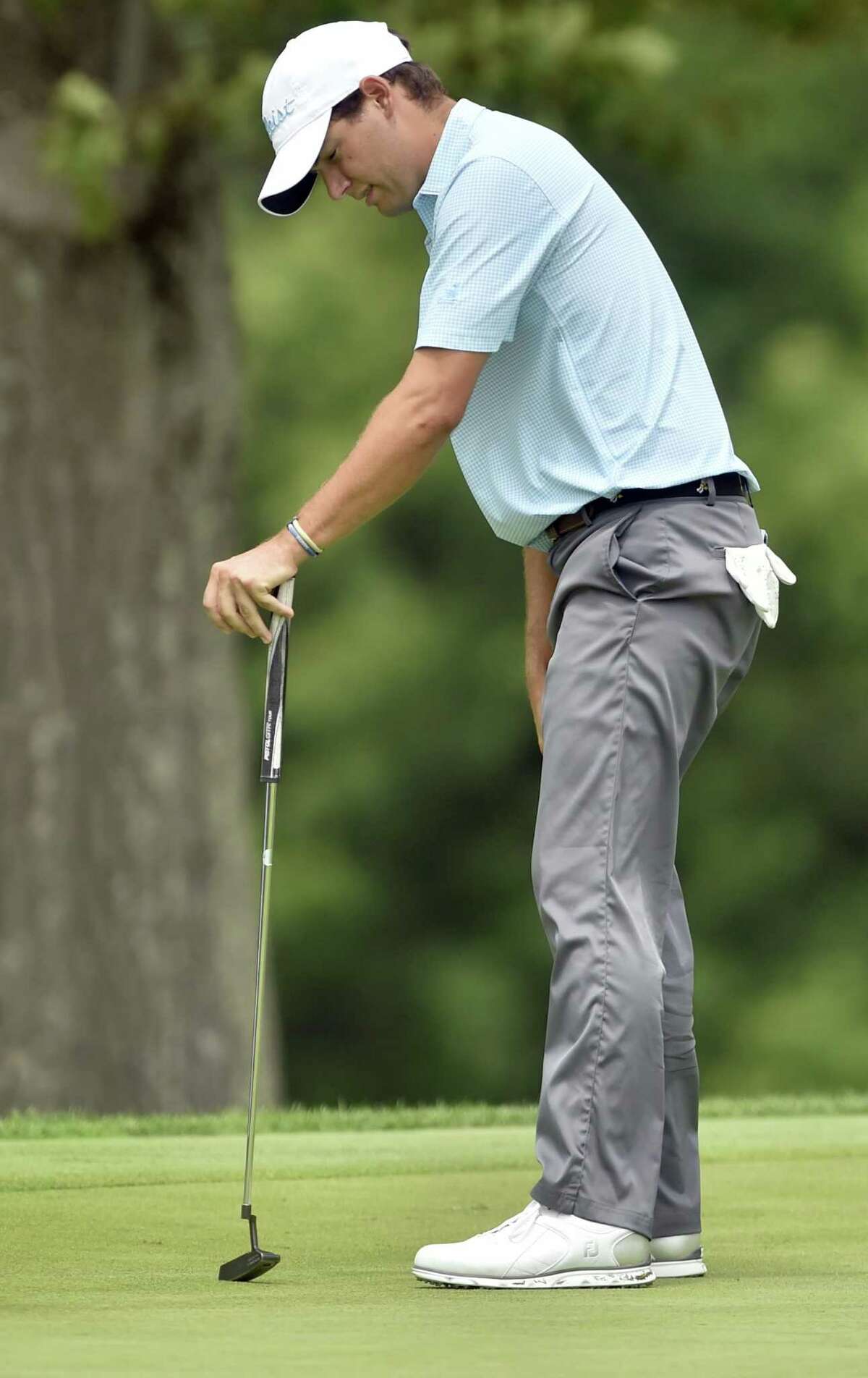 New Canaan’s J.C. Swift of reacts to a missed putt on the 15th hole during the final round of the Connecticut Open Wednesday at the New Haven Country Club in Hamden. Swift finished second behind John VanDerLaan of Southbury.