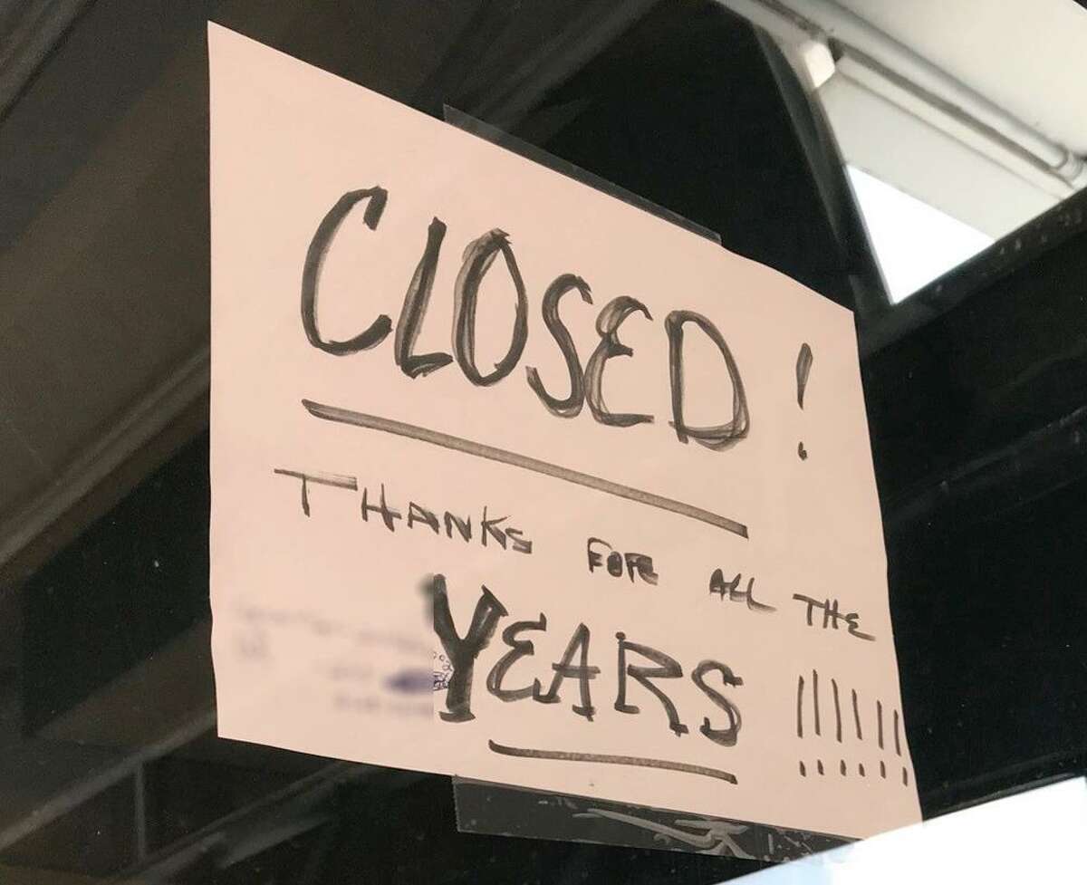 A sign in the window, seen on Tuesday, July 31, 2018, shows that Elan's of Connecticut, a strip club in Danbury, Connecticut, has closed.