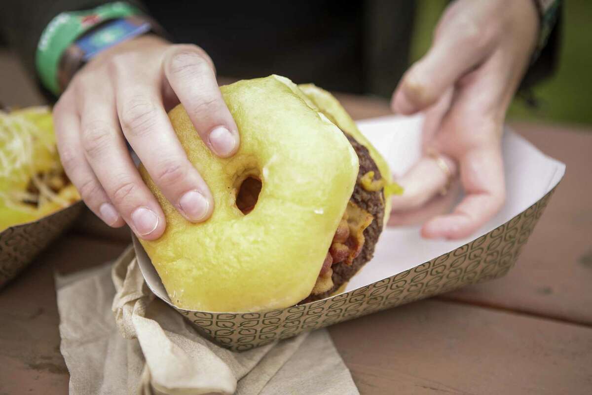 A Donut Cheeseburger with bacon during the 10th annual Outside Lands Festival in Golden Gate Park in San Francisco on Friday, August 11, 2017.