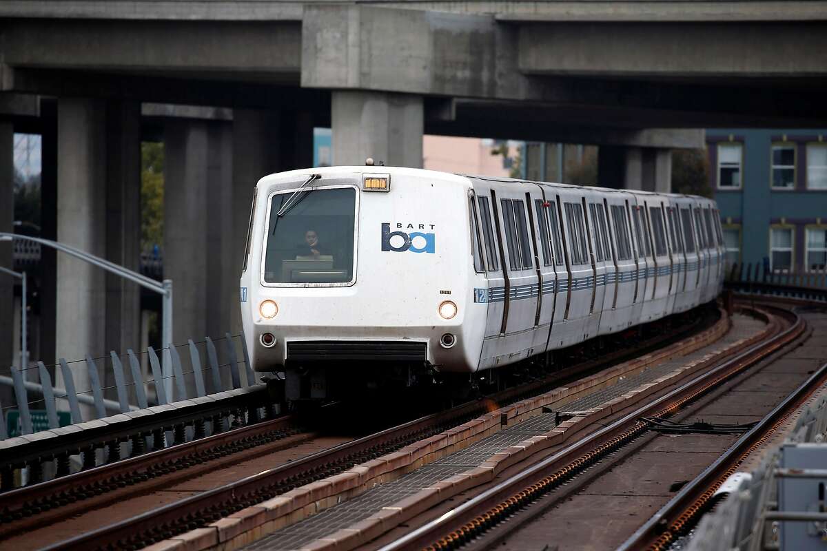 A westbound BART train approaches the West Oakland station in Oakland, Calif. on Thursday, Aug. 2, 2018. BART is setting up a bus bridge between the West Oakland station and the 19th Street and Lake Merritt stations during selected weekends in August and September to perform critical track work.