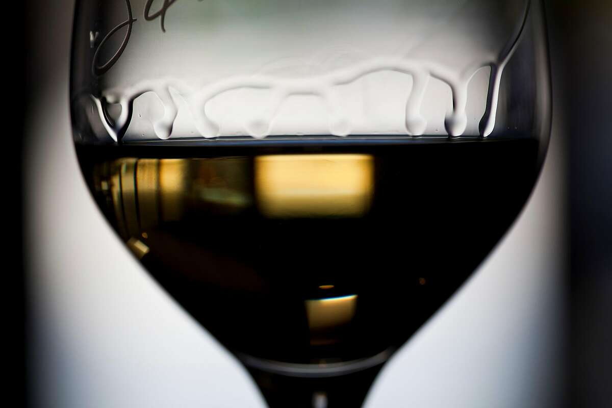 A glass of 2009 �Bella Sandra� Chardonnay inside the Silvestri tasting room in Carmel Village, Calif., Friday, September 7, 2012.