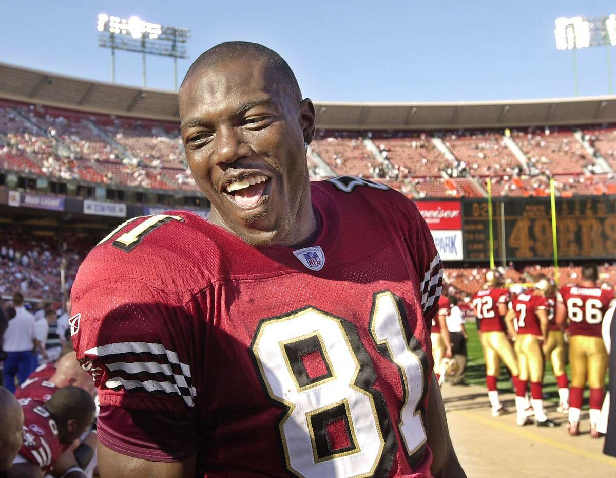 FILE - In this Oct. 6, 2002, file photo, San Francisco 49ers wide receiver Terrell Owens laughs in the last minute of the 49ers' 37-13 win over the St. Louis Rams in the fourth quarter of an NFL football game in San Francisco. 