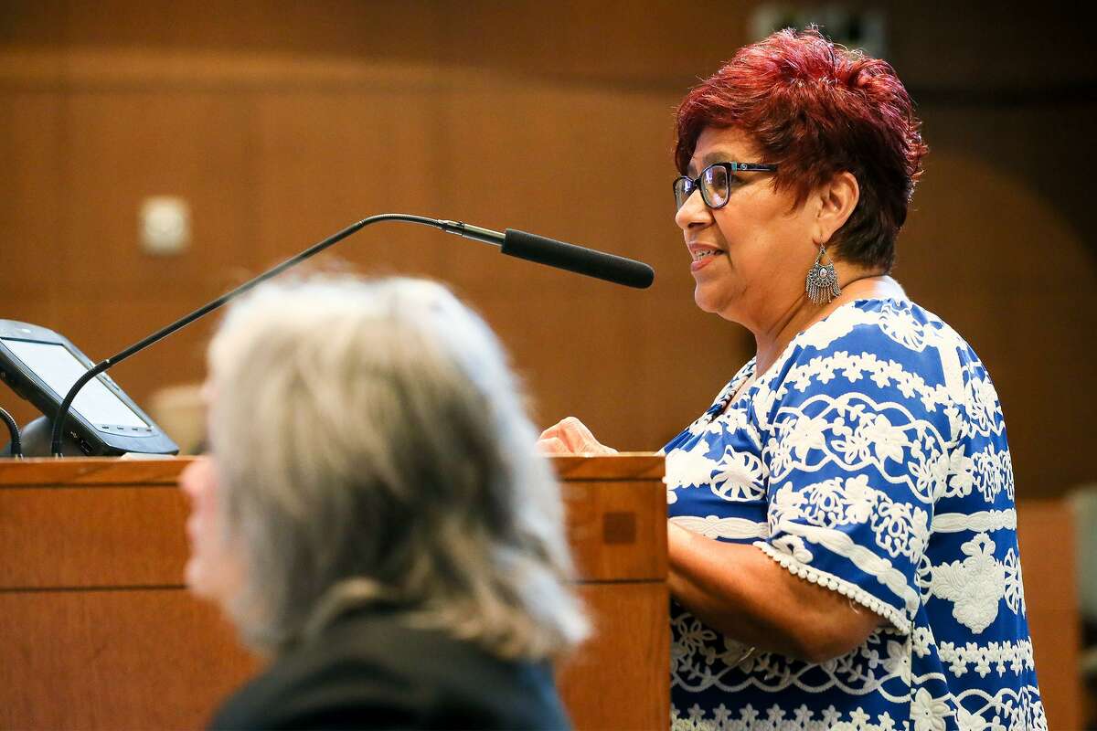 Brenda Pacheco, a lifelong South Side resident, speaks in favor of the city's controversial proposal to downsize the businesses around the mission World Heritage sites during public comment on the issue in the City Council Chamber on Thursday, Aug. 2, 2018.