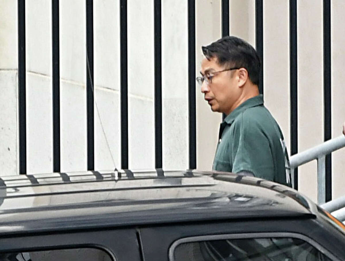 Xiaoqing Zheng, a General Electric engineer federal prosecutors accused of stealing turbine technology from the company, is seen leaving in custody after a detention hearing in federal court in Albany on Aug. 2, 2018. A jury, which had one of the longest deliberations in federal court in Albany in recent memory, convicted him of one charge March 31, 2022. (Lori Van Buren/Times Union)